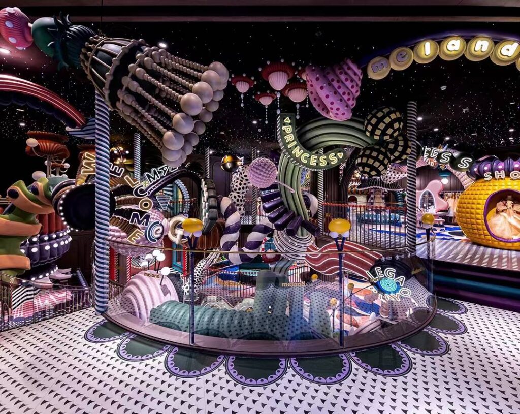 Full-scale 3D printed immersive theme park installations featuring giant mushrooms and starry sky ceiling